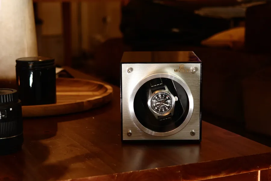 Automatic watch winder on the night stand: should you put your watch inside or wear it while sleeping?