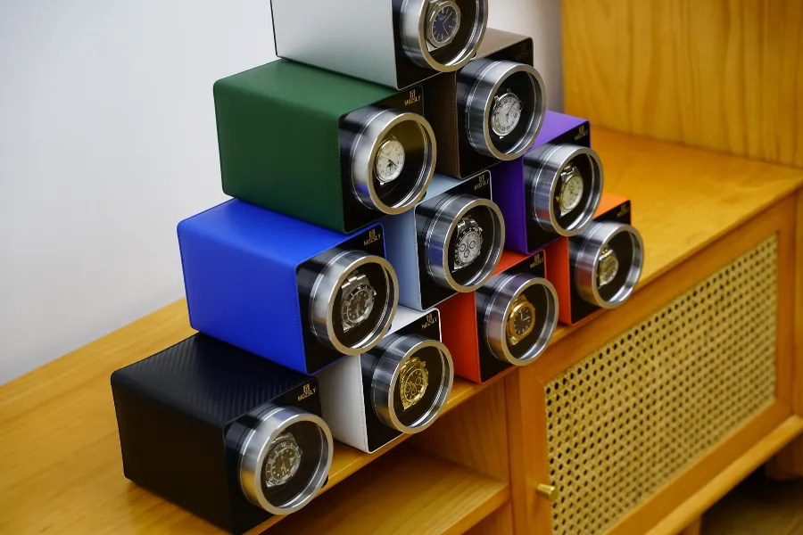 A collection of various colorful Mozsly watch winder